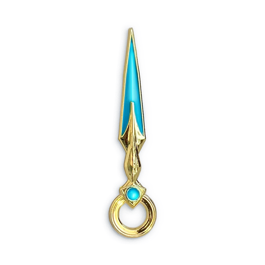 A product photo of the Blue Lyrium Dagger Enamel Pin. The blade of the dagger is bright cerulean blue cast in gold metal. The hilt is gold with blue enamel accents.