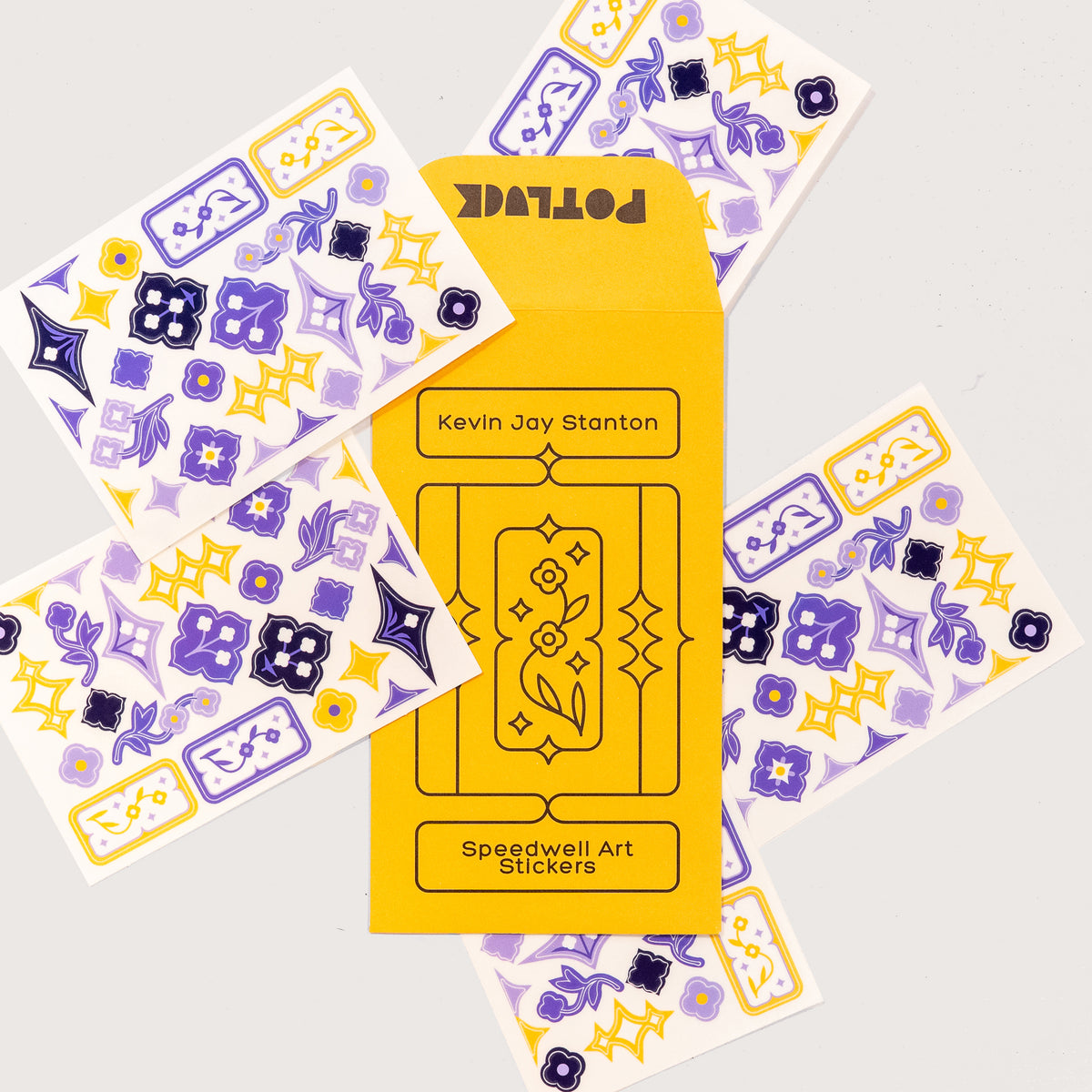 A set of Speedwell Art Stickers by Kevin Jay Stanton, featuring the yellow seed envelope packaging in the center surrounded by five sticker sheets with illustrations of Speedwell flowers in indigo, yellow, and white.