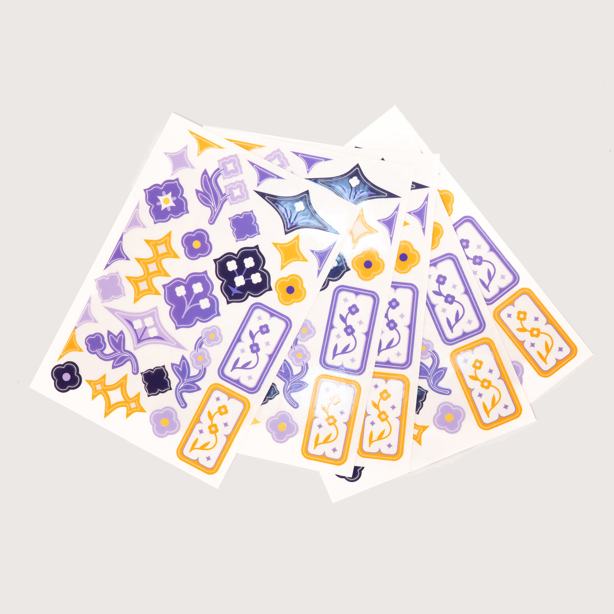 Five sheets of the Speedwell Art Stickers by Kevin Jay Stanton fanned against a white background.