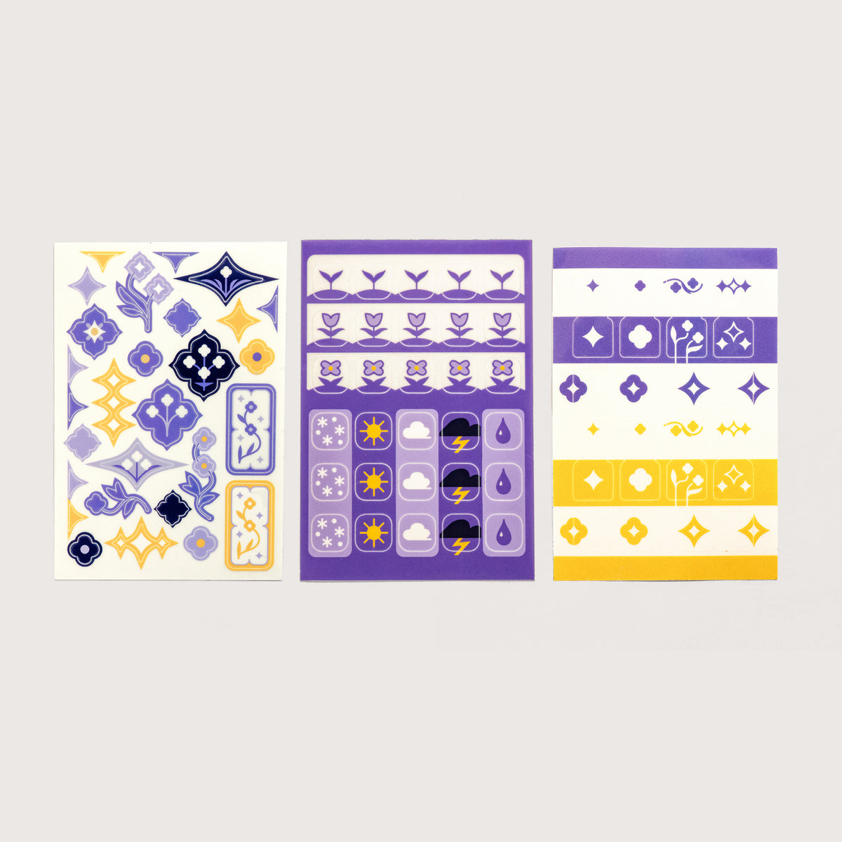 A single sheet of each sticker sheet design: Speedwell Art Stickers, Icon Stickers, and Tab Divider Stickers photographed against a white background.