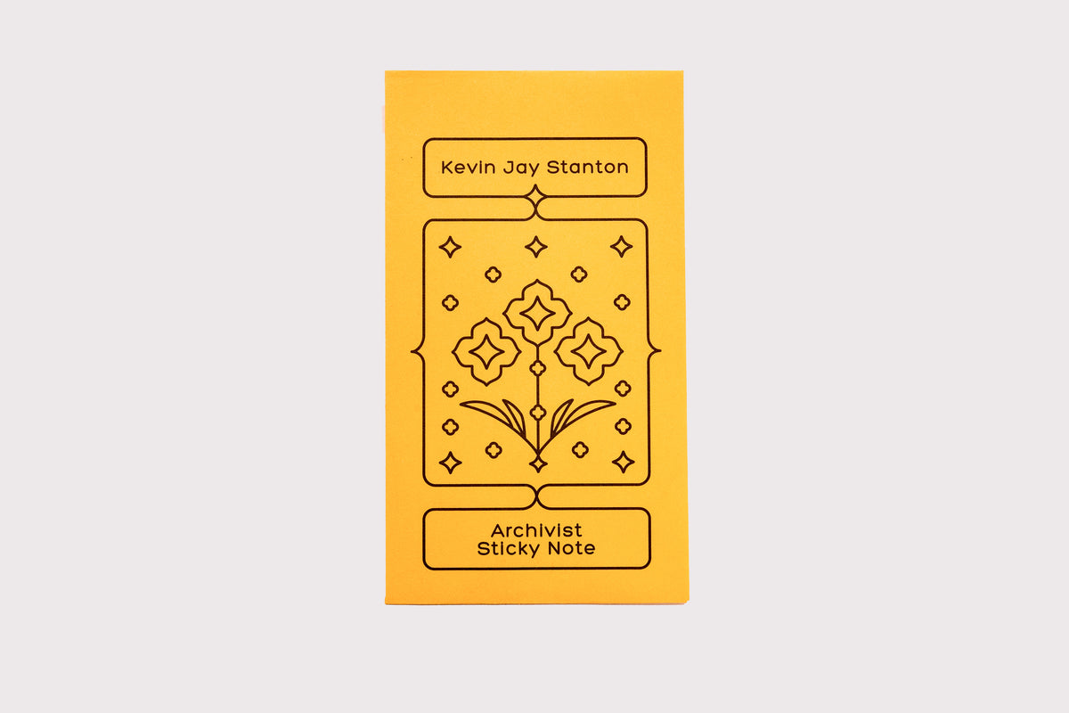 The yellow envelope packaging for the Archivist Sticky Note by Kevin Jay Stanton against a white background.