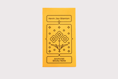 The yellow envelope packaging for the Archivist Sticky Note by Kevin Jay Stanton against a white background.