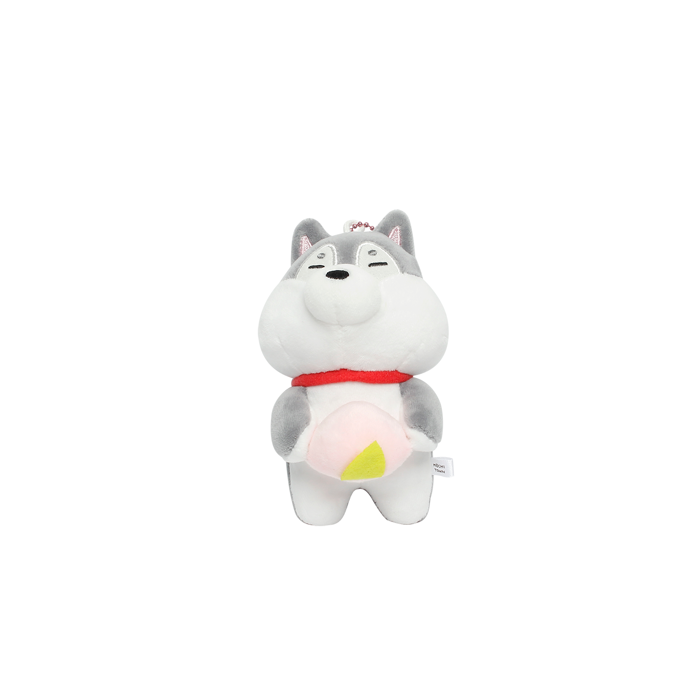 Front view of husky dog keyring holding a peach.