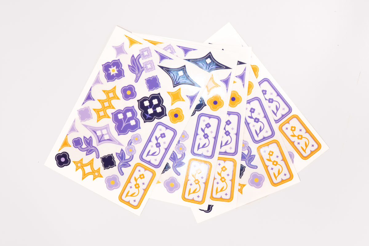 Five sheets of the Speedwell Art Stickers by Kevin Jay Stanton fanned against a white background.