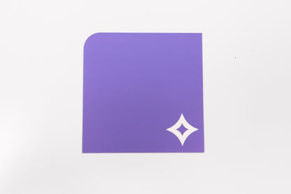 A single Pocket Sticker with white diamond motif photographed against a white background.