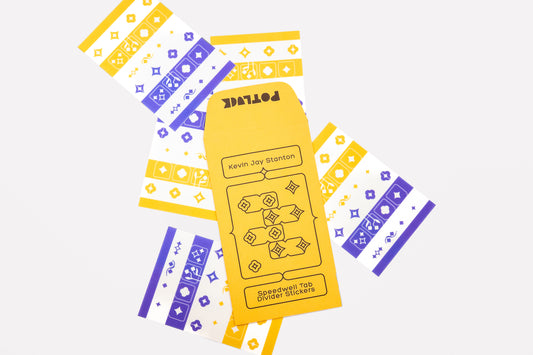 A set of Speedwell Tab Divider Stickers by Kevin Jay Stanton, featuring the yellow seed envelope packaging in the center surrounded by five sticker sheets of tab dividers in indigo, yellow, and white.