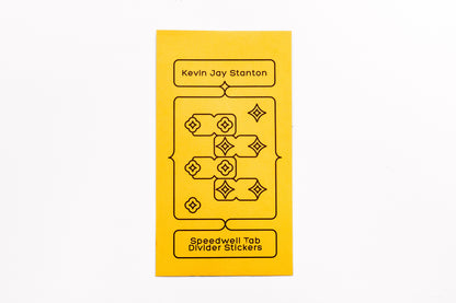The yellow envelope packaging for the Speedwell Tab Divider Stickers by Kevin Jay Stanton against a white background.